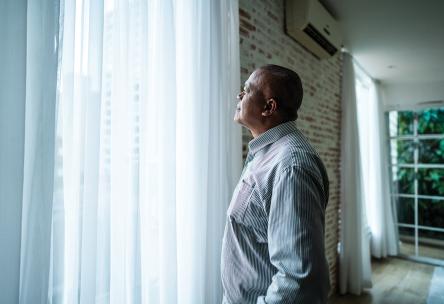 A man looking out of the window.