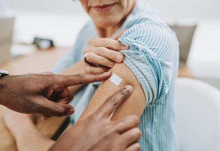 Woman with bandage on arm