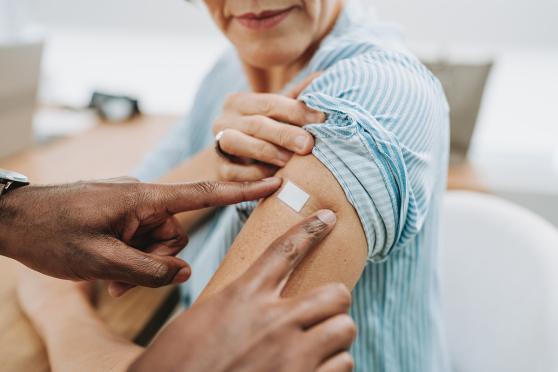 Woman with bandage on arm
